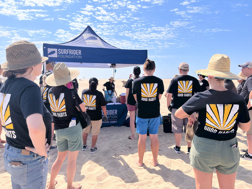 Surfrider cleanup crew getting instructions.