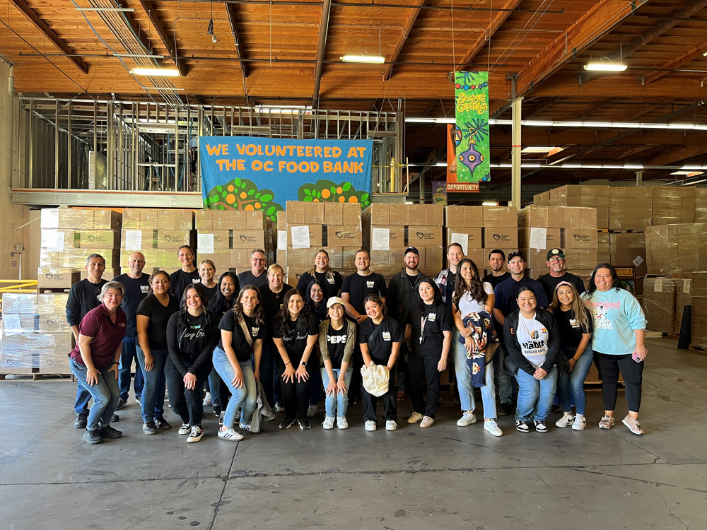 Group photo of Habit Burger & Grill volunteers at the Orange County Food Bank