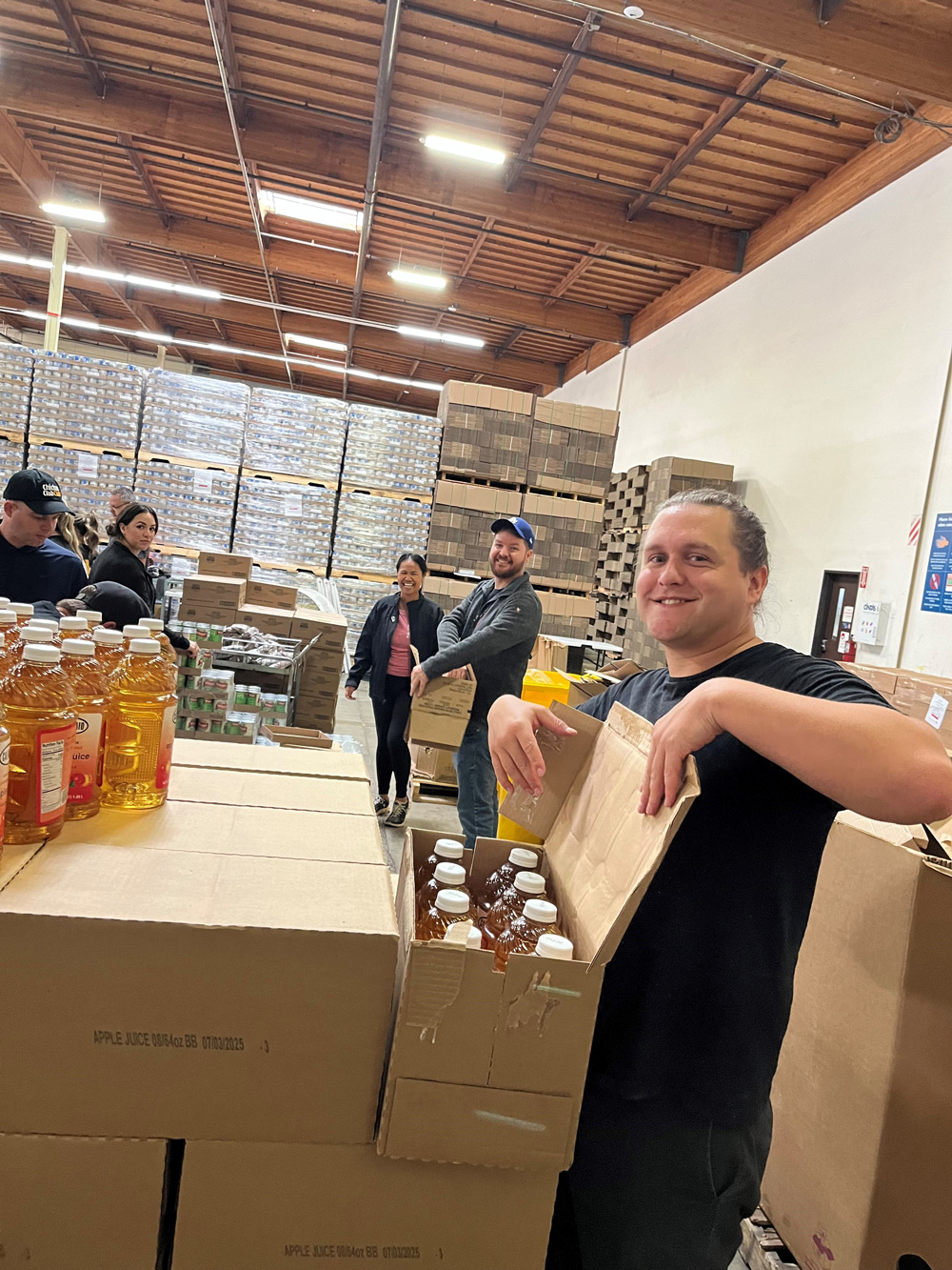 Smiling Orange County Food Bank volunteers