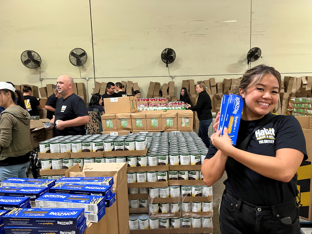 Smiling volunteer at the Orange County Food Bank